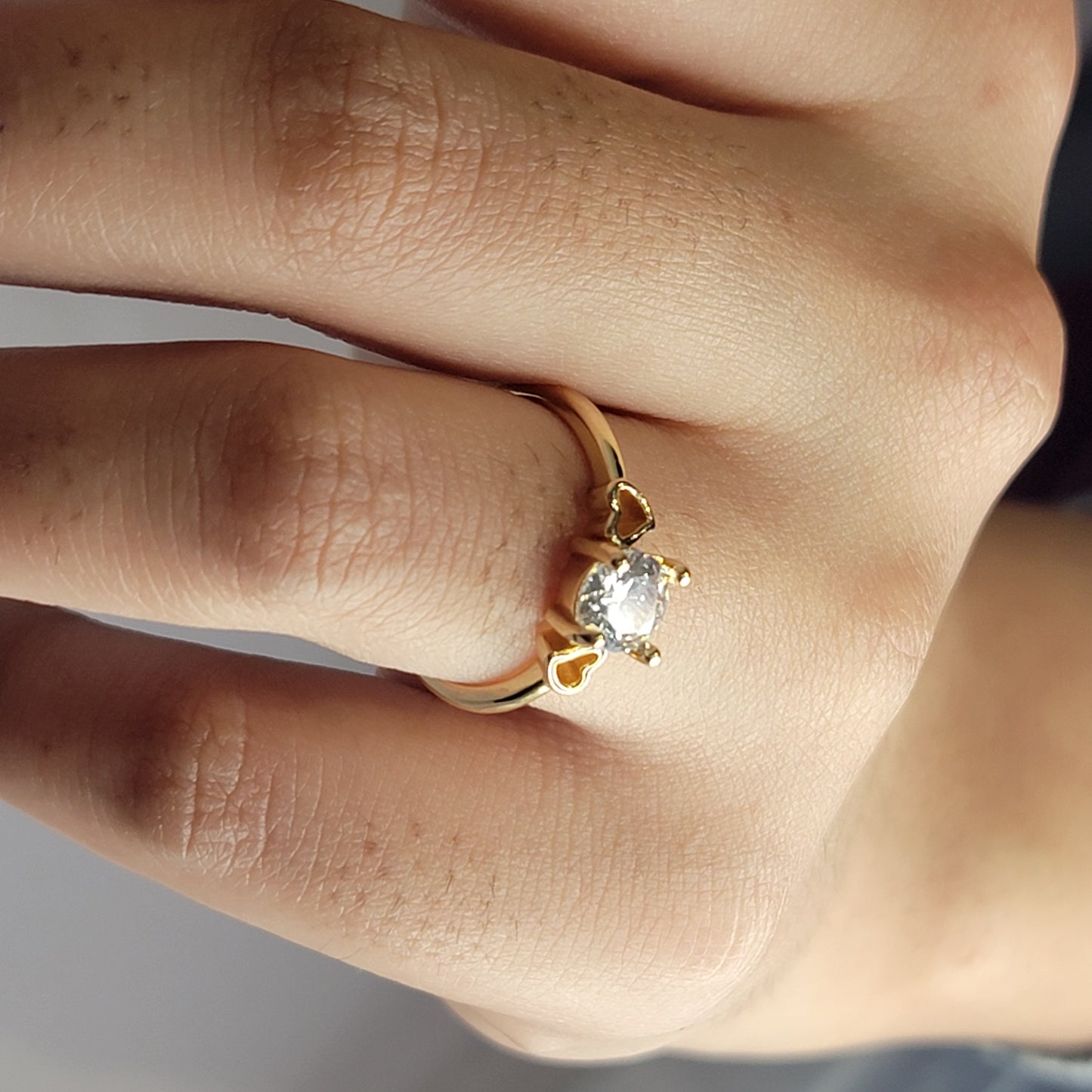 Elegant Gold Heart-Inspired Solitaire Ring with Brilliant-Cut Stone