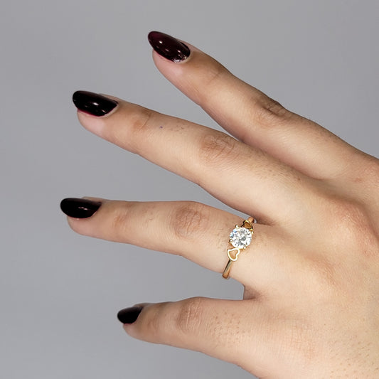 Elegant Gold Heart-Inspired Solitaire Ring with Brilliant-Cut Stone